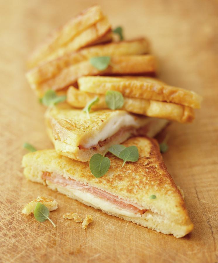 Several Toasted Ham And Cheese Sandwiches Photograph by Michael Wissing