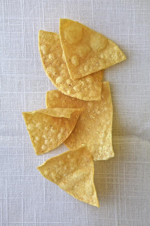 Several Tortilla Chips On A White Background top View Photograph by Andre Baranowski