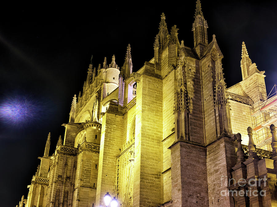 Seville Cathedral Dimensions at Night in Spain Photograph by John Rizzuto