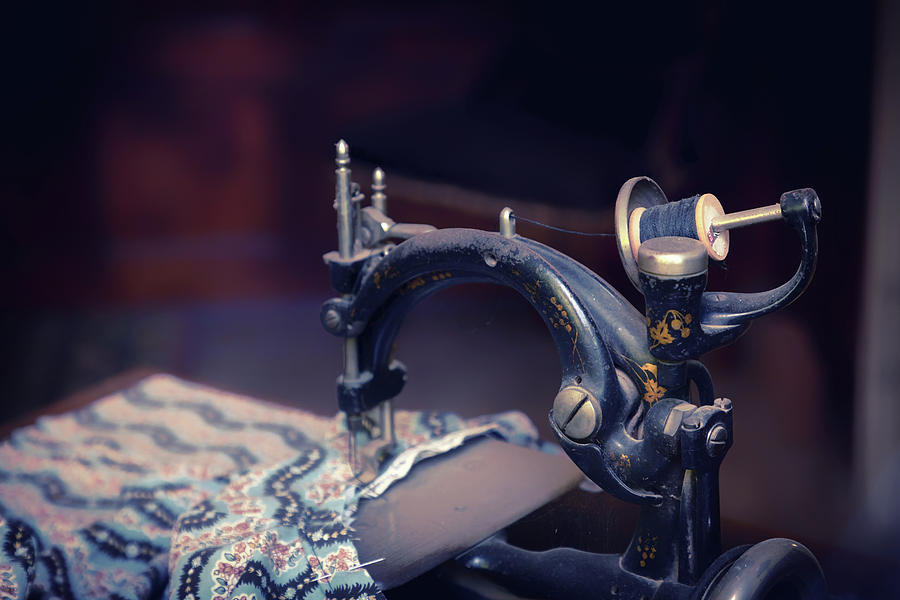 Sewing In Color Photograph