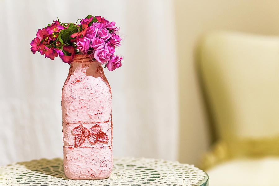 Shabby chic style bottle with fake flowers Photograph by Vivida Photo PC