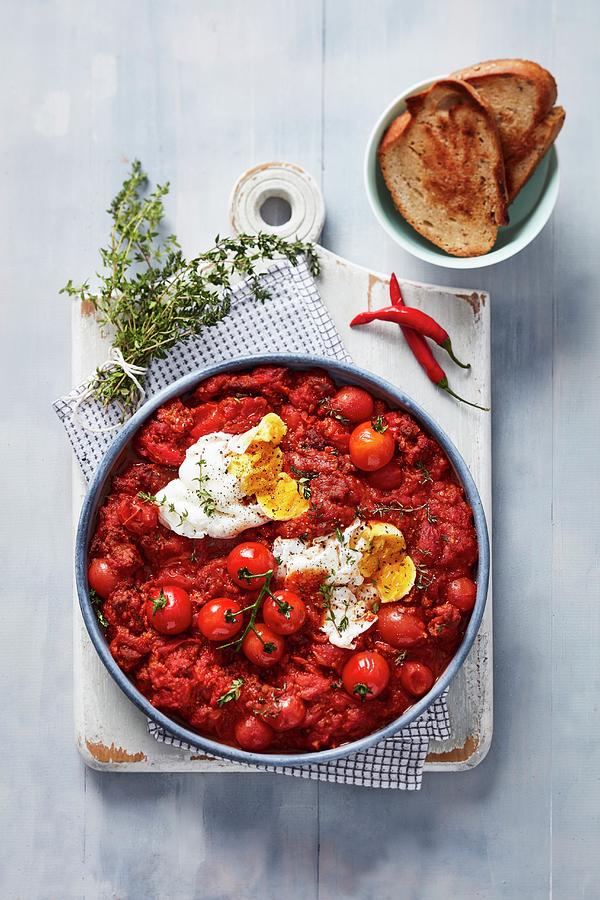 Shakshuka poached Eggs In A Spicy Tomato Sauce Photograph by Great Stock!