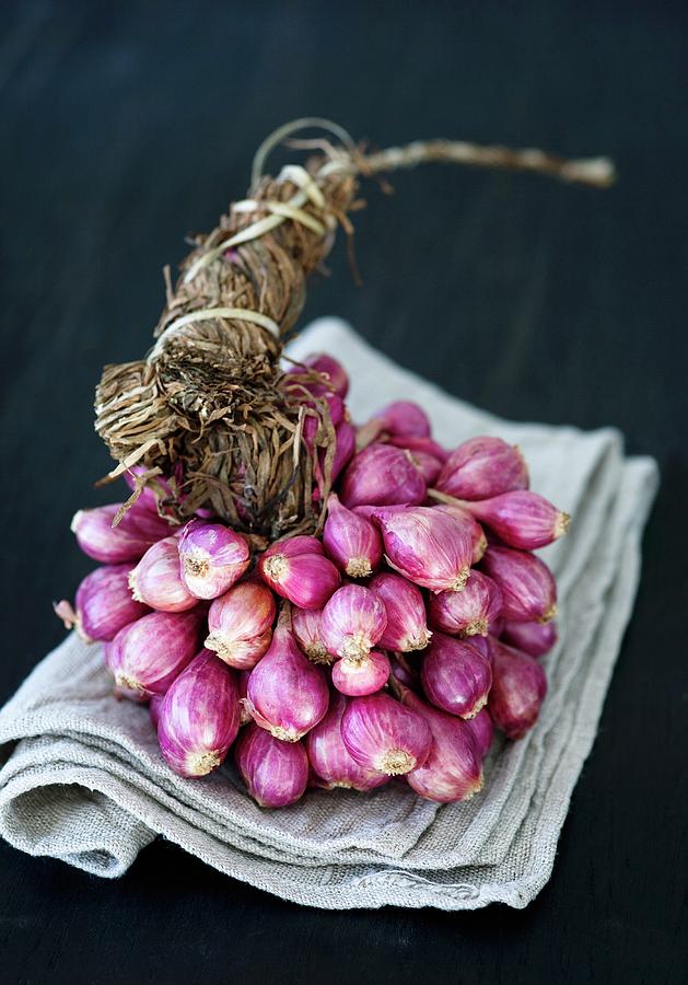Shallots Tied In A Bundle, On A Cloth Photograph by Firmston, Victoria