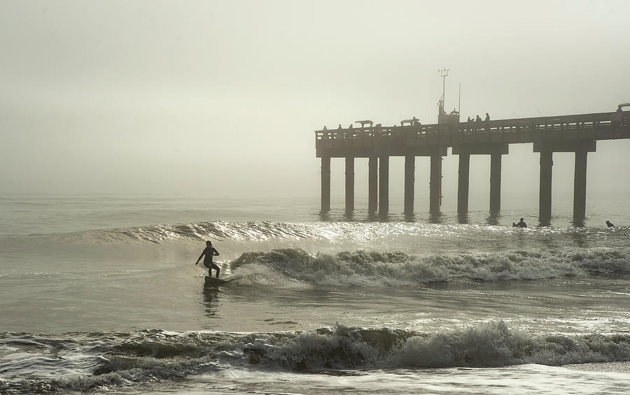 Black And White Photograph - She is Surfing in the Fog by Janal Koenig