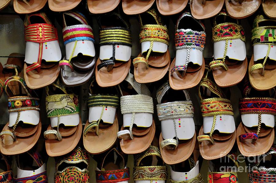 Shelf of leather hand made colorful Pakistani sandal shoes Karachi Pakistan Photograph by Imran Ahmed