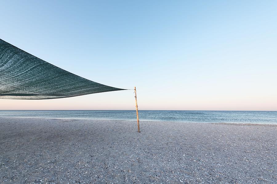 Summer Photograph - Shelter From The Sun On Tropical Beach by Ivan Kmit