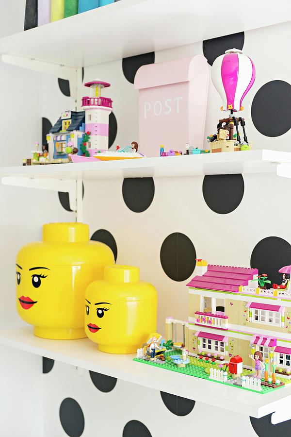 Shelves Of Toys On Polka-dot Wall Photograph by Cecilia Mller