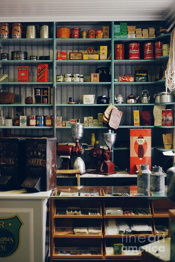 Shelves with products in old store Photograph by Joaquin Corbalan