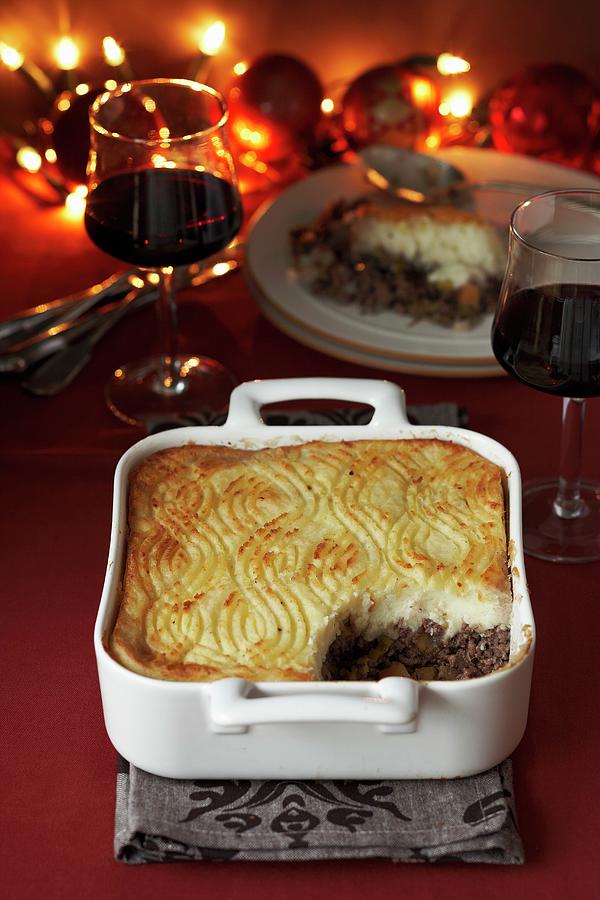 Shepherds Pie, With A Portion Missing, And Two Glasses Of Red Wine christmas Photograph by Charlotte Tolhurst