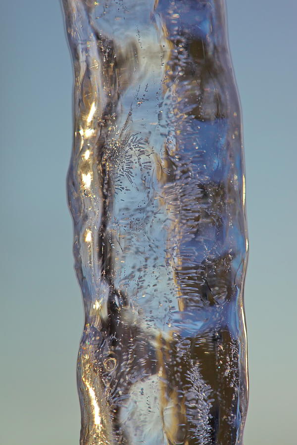 Shimmering single icicle Photograph by Intensivelight
