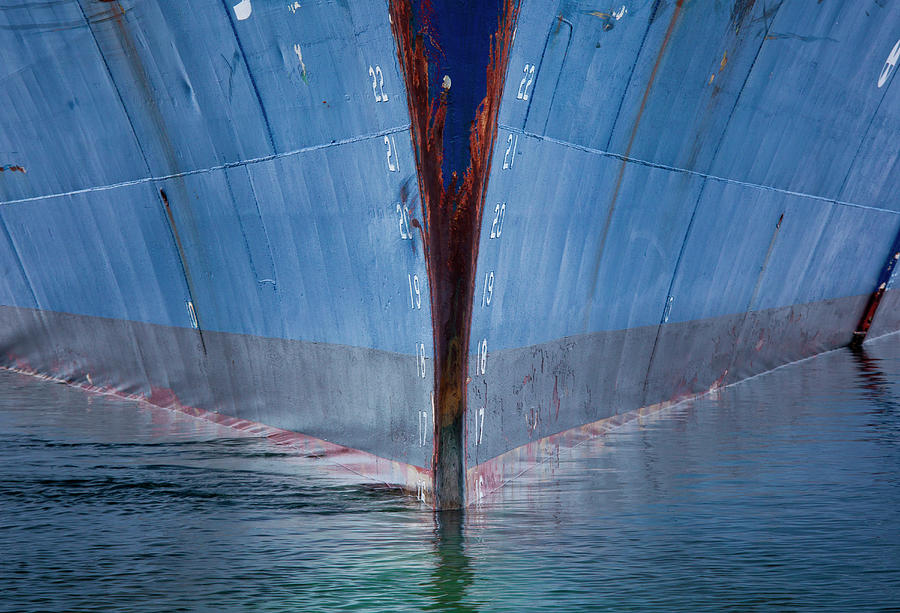 Ship Hull In The Water, Antarctica. The Photograph by Mint Images/ Art Wolfe