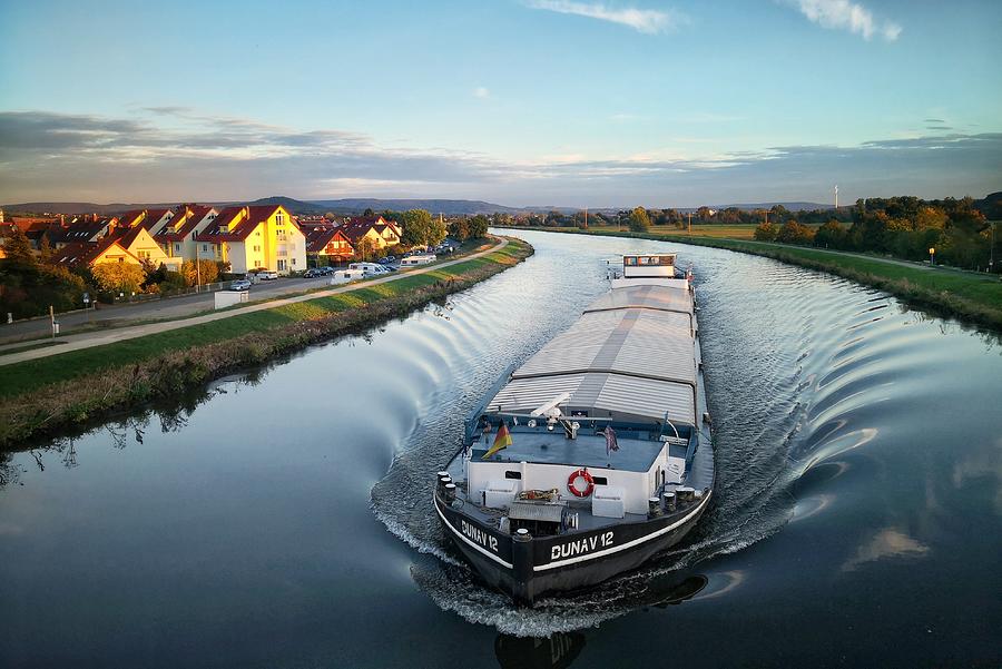 Sunset Photograph - Ship On Main - Danube Canal by Nicolae  Stefanel Rusu