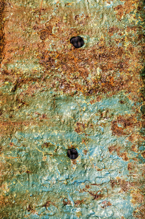 Ships hull with peeling blue paint, rust and holes Photograph by Frans Blok