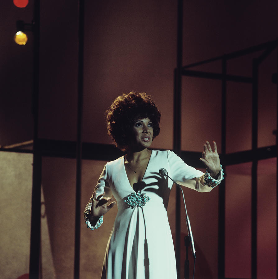Shirley Bassey Performs On Stage Photograph by Colin Fuller