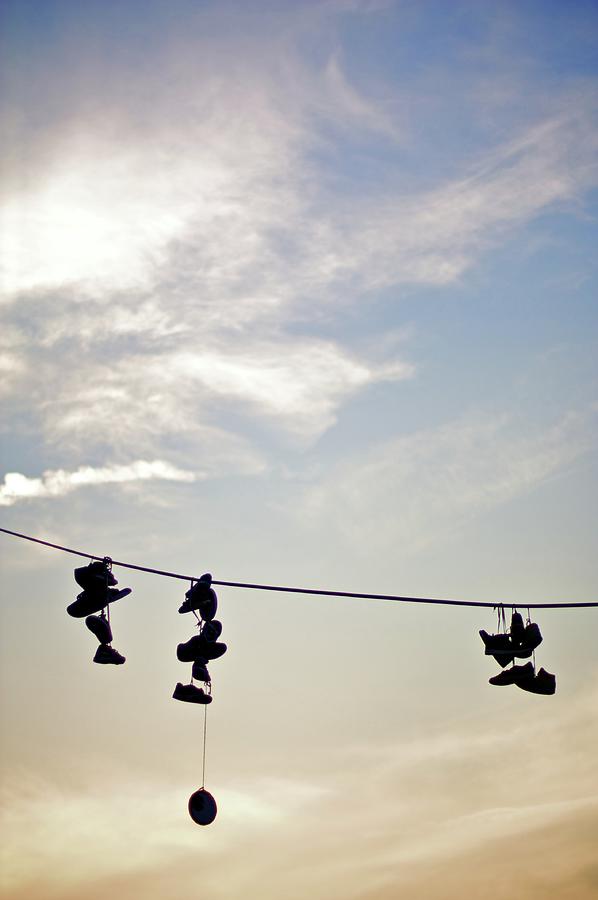 Shoes On A Line Photograph by Bailey