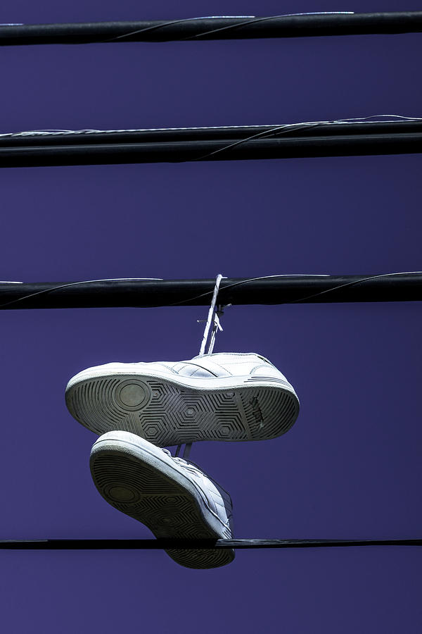 shoes on electric line