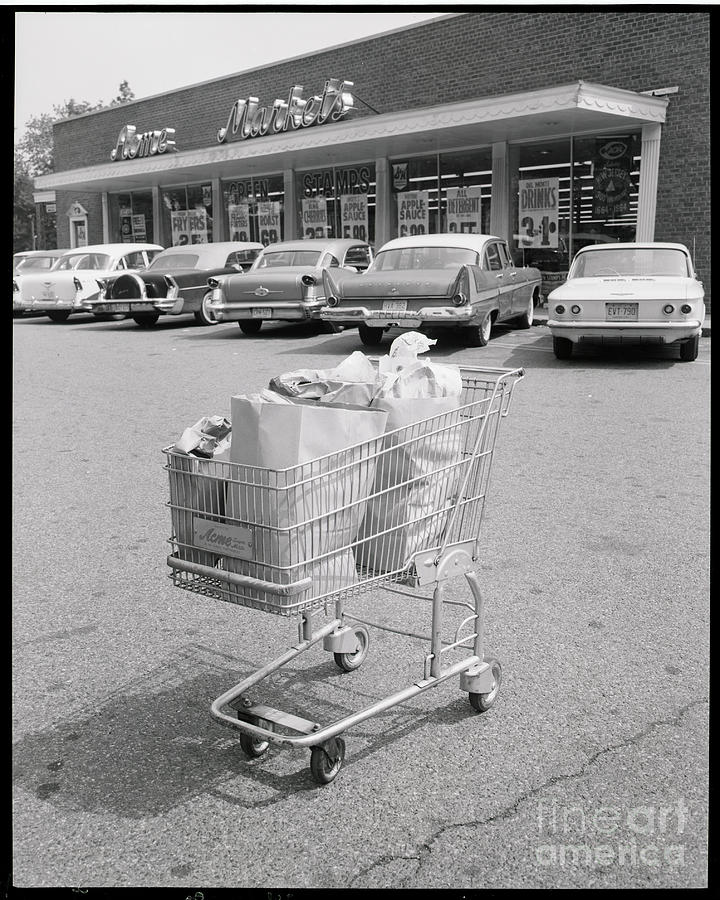 Shopping Cart In Parking Lot Photograph by Bettmann