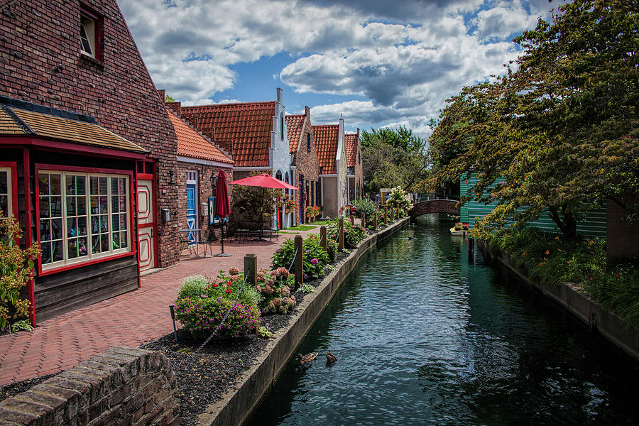 Shops along the Canal in Dutch Village Photograph by Randall Nyhof