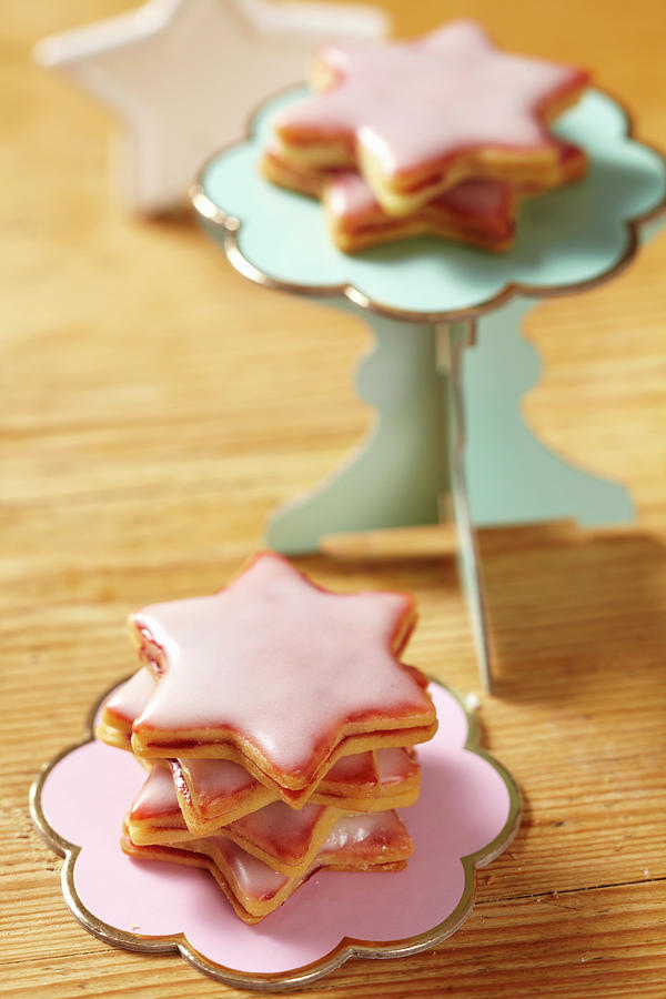 Shortbread Star Biscuits With Raspberry Jam And Icing Photograph by Teubner Foodfoto