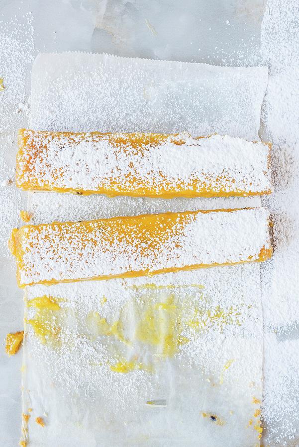 Shortbread With Passion Fruit And Icing Sugar Photograph by Hein Van Tonder