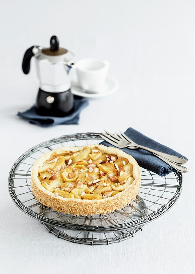 Shortcrust Apple Cake With Slivered Almond On A Cake Stand Photograph by Julia Hildebrand