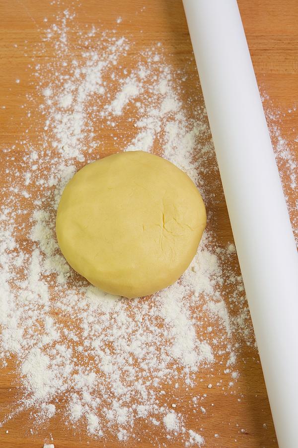 Shortcrust Pastry And A Rolling Pin On A Floured Work Surface Photograph by Esther Hildebrandt