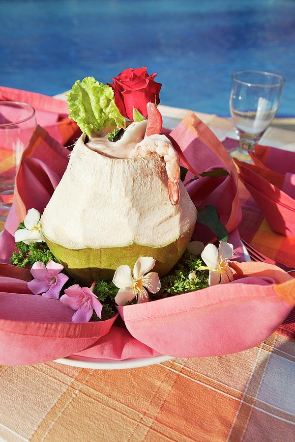 Shrimp Cocktail With Coconut Milk Served In A Hollowed Out Coconut Photograph by Laura Rizzi