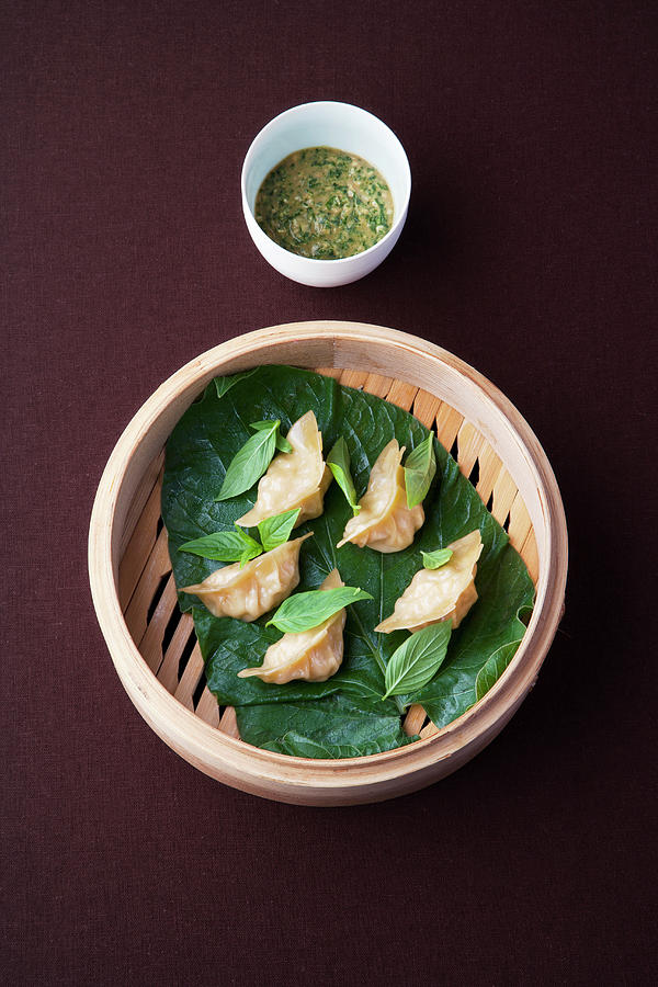 Shrimp Dim Sum Steamed In Pepper Leaves With Miso Salsa Photograph by Michael Wissing