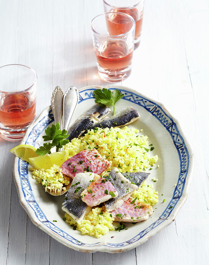 Sicilian Saffron Couscous With Red Mullet And Sardines Photograph by Teubner Foodfoto