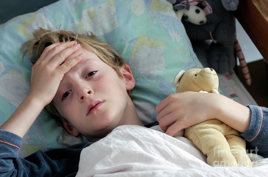 Sick Boy Photograph by Claire Deprez/reporters/science Photo Library