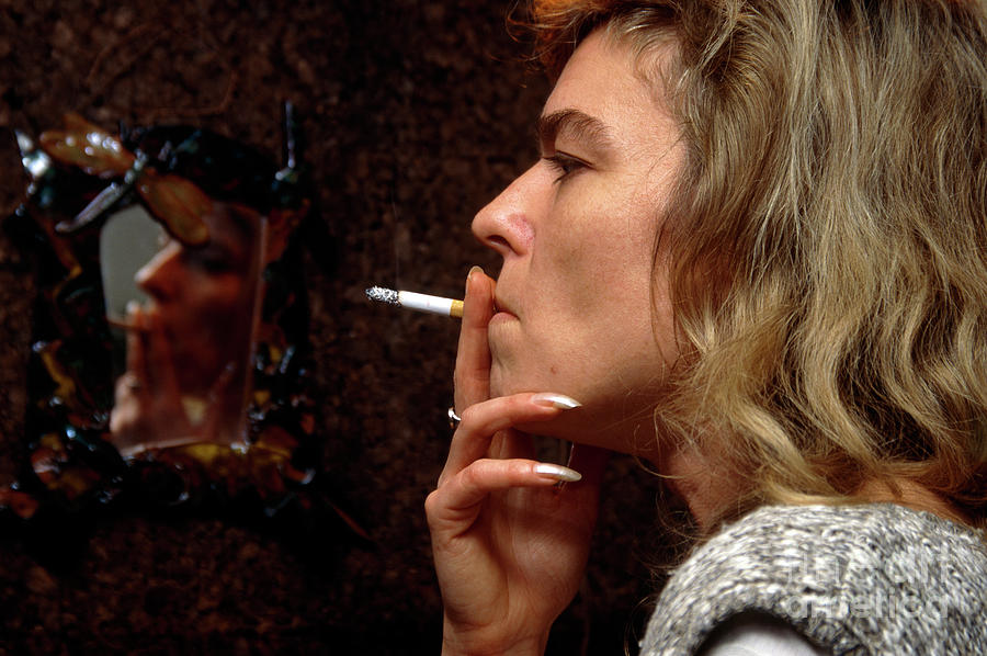 Side View Of A Woman Smoking A Cigarette Photograph by Conor Caffrey ...