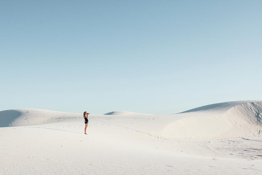 White Sands National Monument Photograph - Side View Of Woman Standing At White Sands National Monument Against Clear Sky by Cavan Images