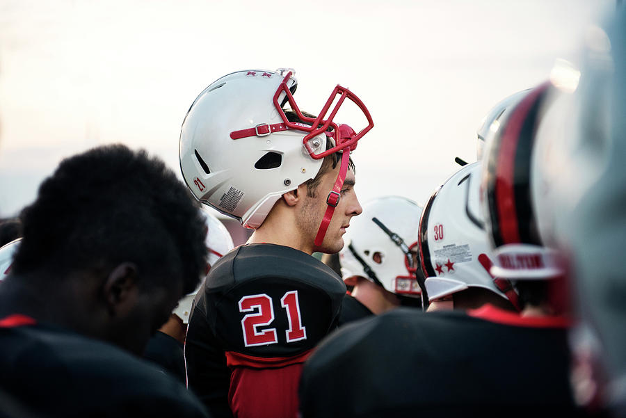 Side View Teenage American Football Player With Helmet Against Sky ...