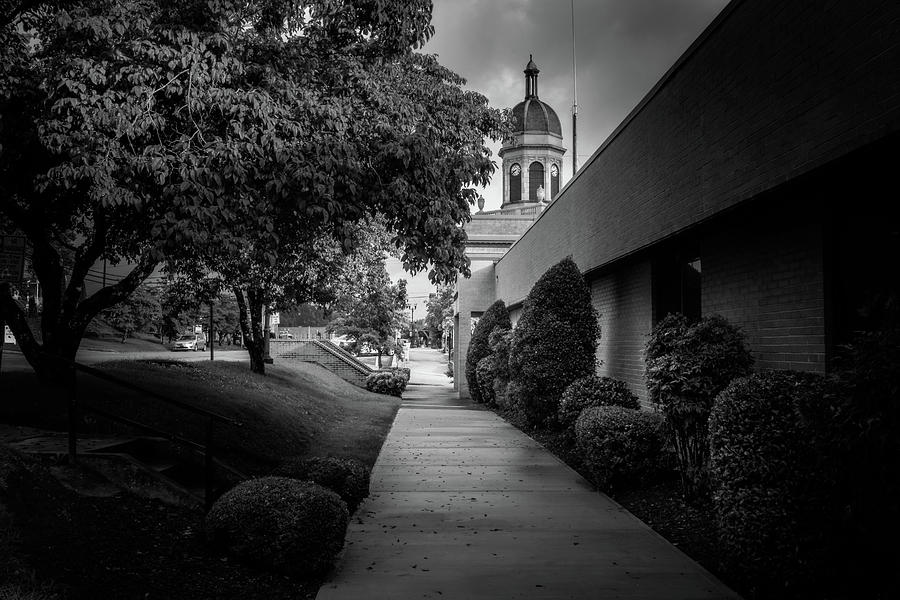 Sidewalk To The Courthouse In Black and White Photograph by Greg and Chrystal Mimbs