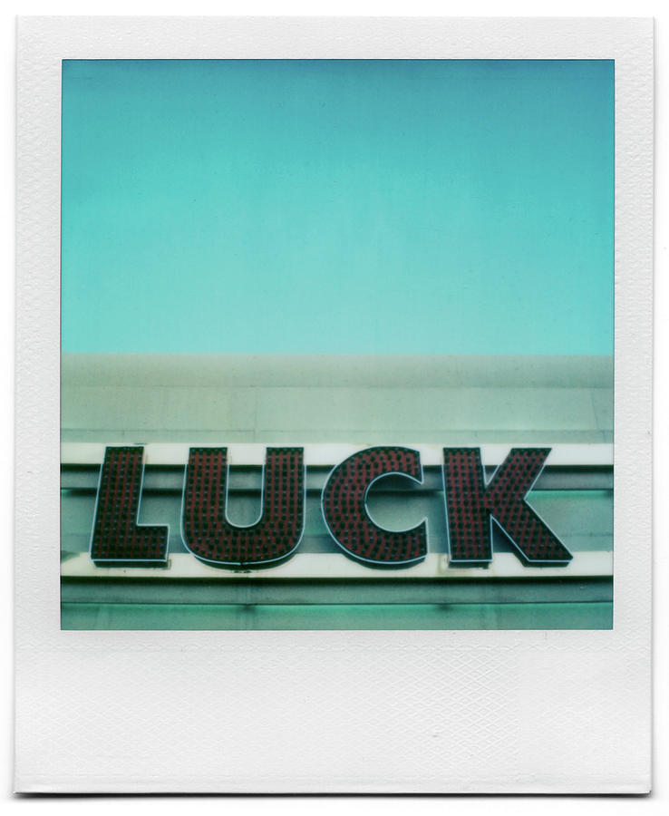 Sign Of Luck Photograph by Grant Hamilton