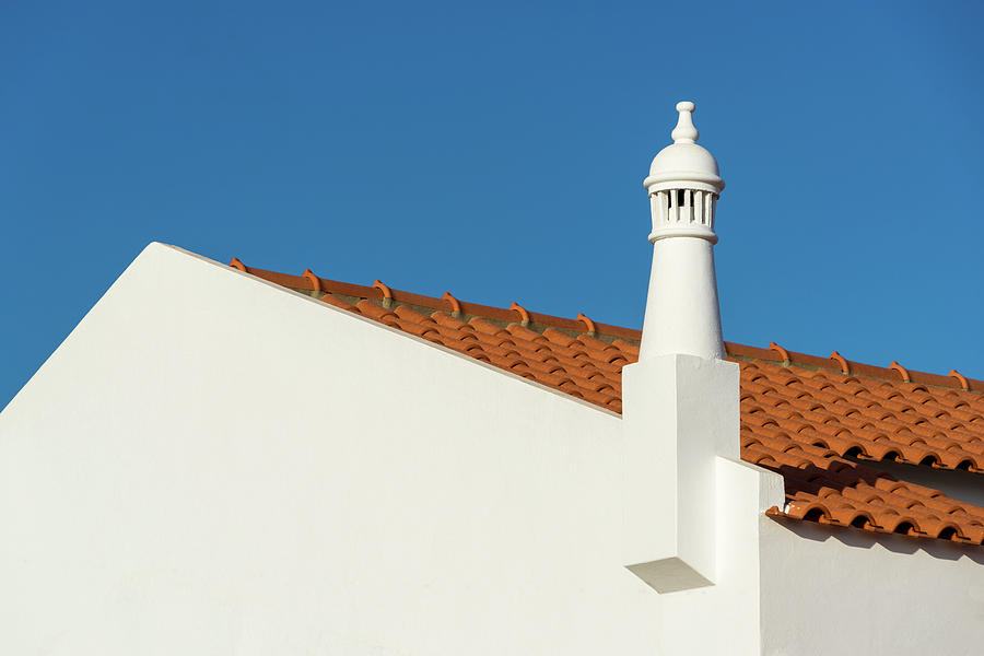 Signature Algarvian Roofline - Red Terracotta Tiles and Classic Fretted Crown Chimney Photograph by Georgia Mizuleva