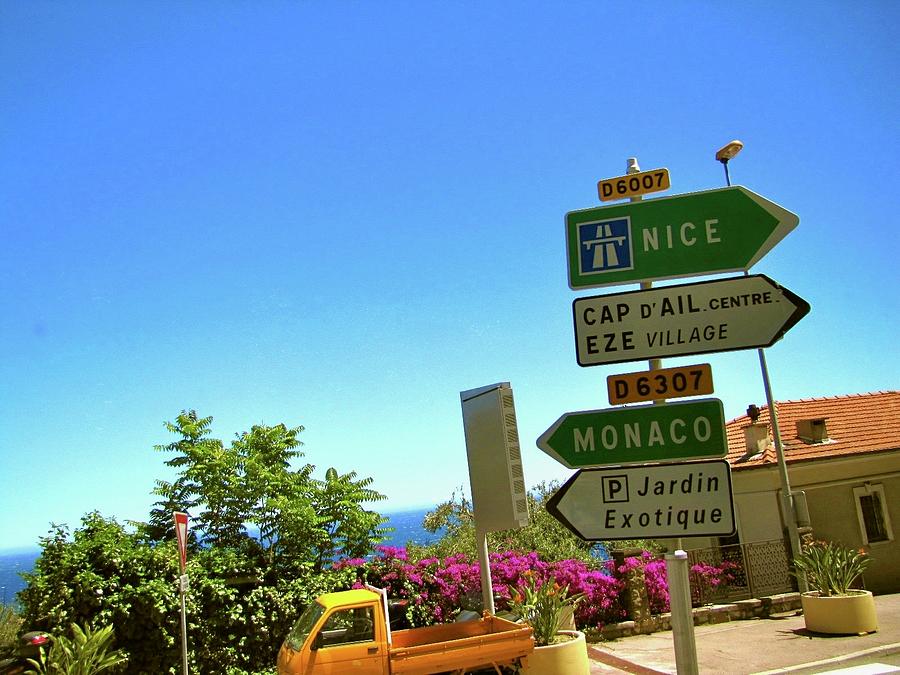 Signs in Monaco Photograph by Chris Bavelles