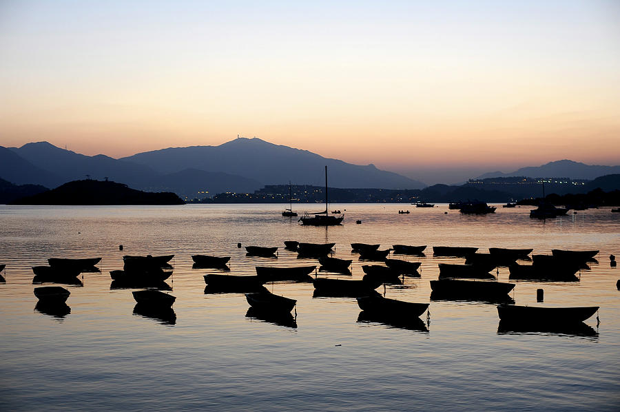 Silhouette Boats At Sunset Photograph by Jdnyim