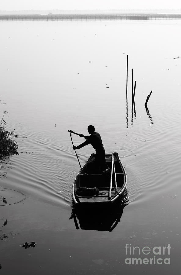 Boatman Photograph - Silhouette Of A Boatman Rowing by Gwoeii Boatman Photograph - Silhouette Of A Boatman Rowing by Gwoeii