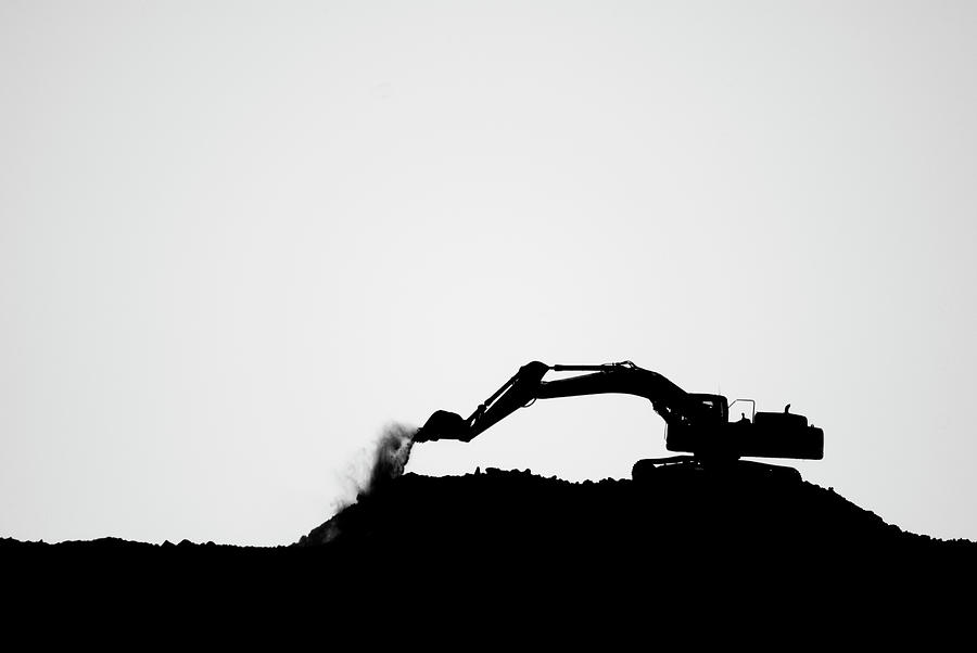 Silhouette Of A Bulldozer Digging In Photograph by Hans Neleman