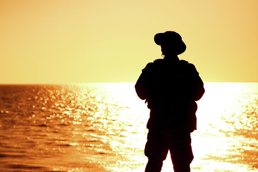 Silhouette Of A Soldier In Boonie Hat Photograph by Oleg Zabielin