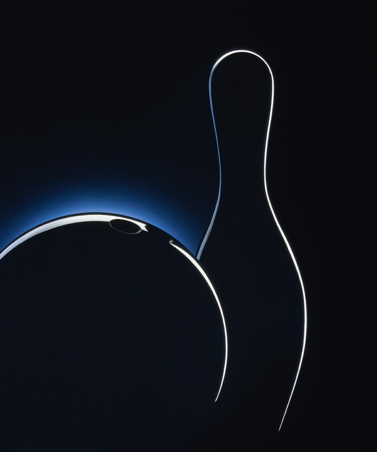 Silhouette Of Bowling Pin And Ball Photograph by Tony Garcia