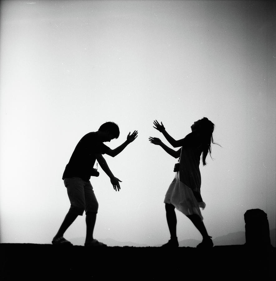 Silhouette Of Couple Dancing During Photograph by Jdnyim
