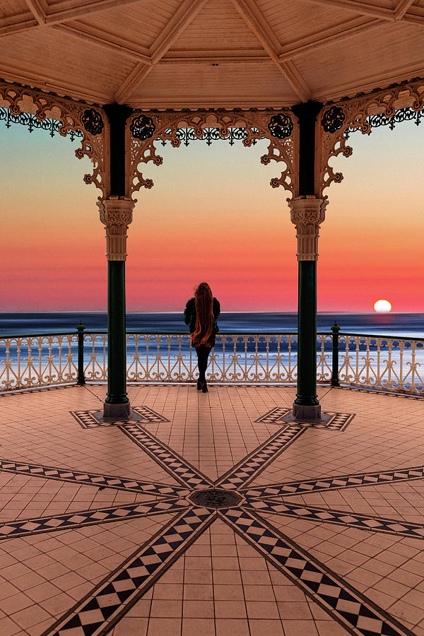 Architecture Photograph - Silhouette of girl  on Brighton Bandstand by Maggie Mccall