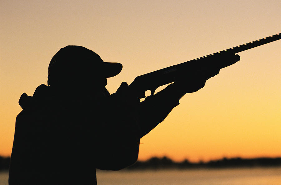 Silhouette Of Hunter And Gun Photograph by J&l Images