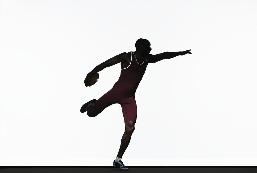 Silhouette Of Male Discus Thrower, Side Photograph by Paul Taylor