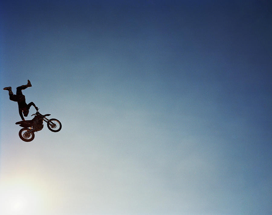 Silhouette Of Man Performing Stunts On Photograph by Andy Ryan