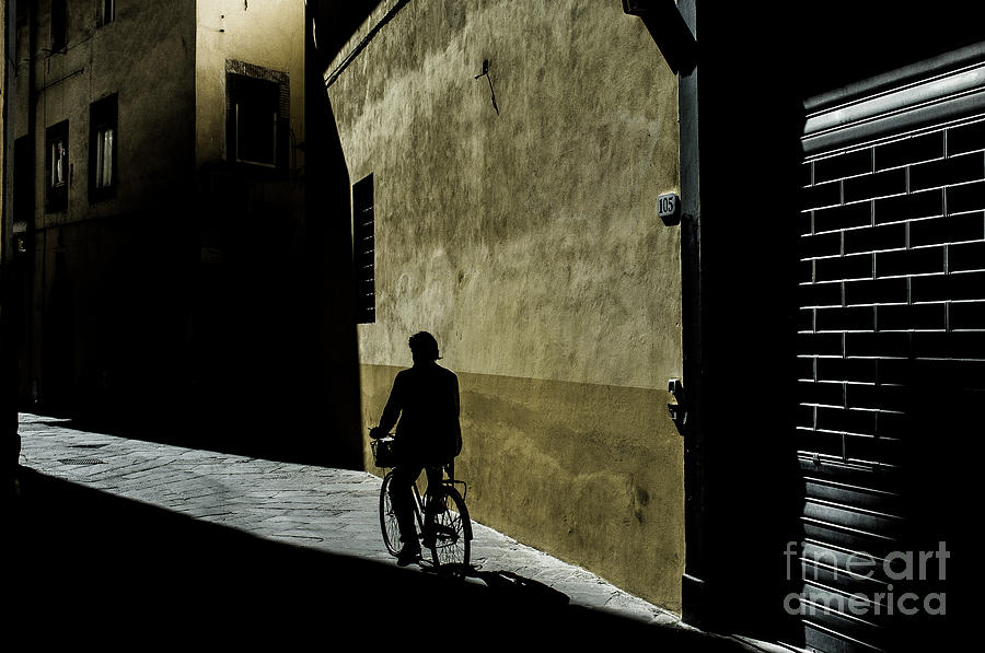 Silhouette Of Person Riding Bike In Photograph by Raffaello Ferrari