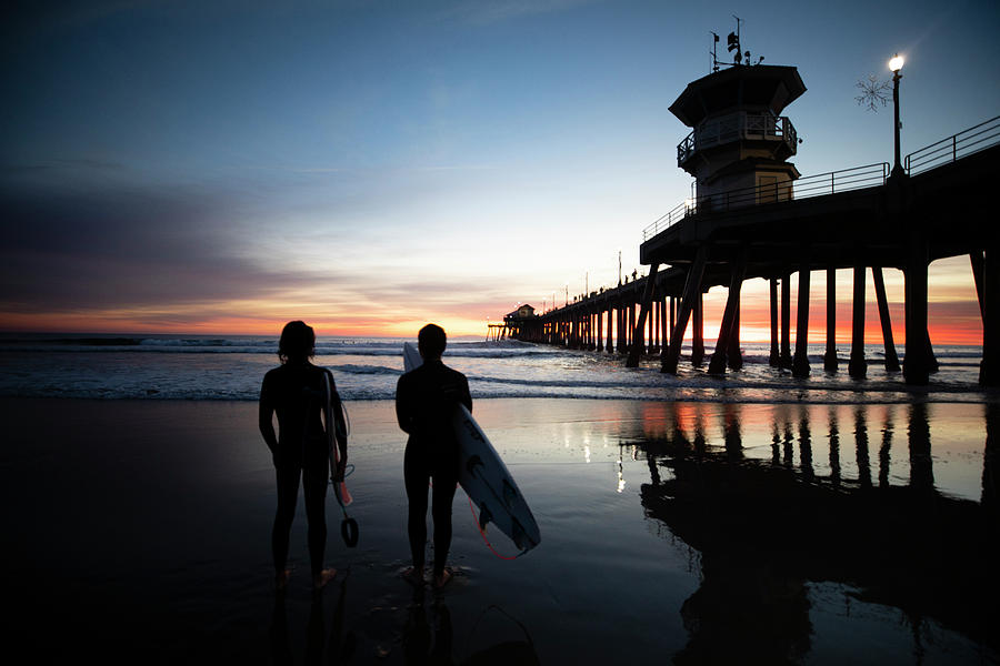 Silhouettes Of Surfers At Huntington Photograph by Panoramic Images