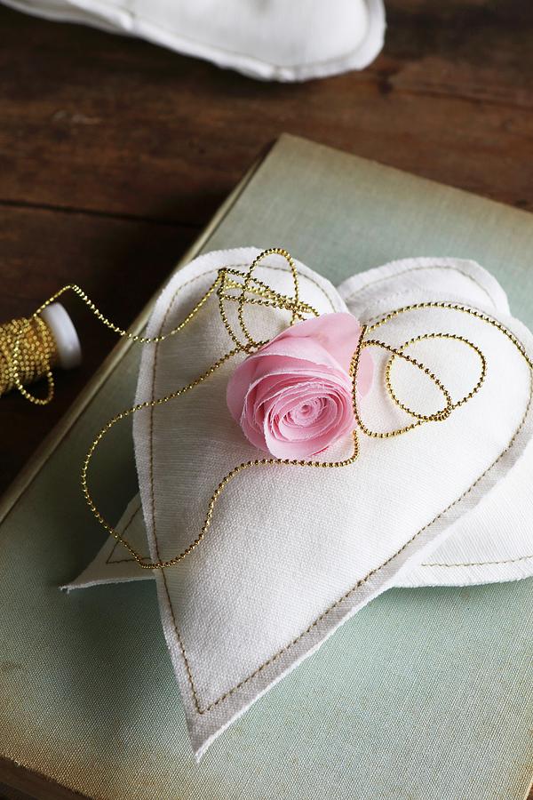 Silk Flower On Two Hand-sewn Fabric Hearts Photograph by Regina Hippel